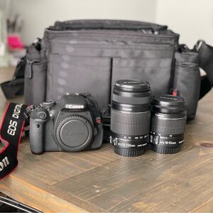 Canon EOS Rebel T3i with two different lenses and camera bag.